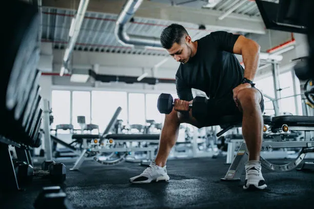 Man training with gym equipment